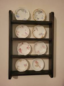 lot 105 image: Set of 8 Antique Limoges Porcelain Butter Pat Chip Plates and Display Shelf