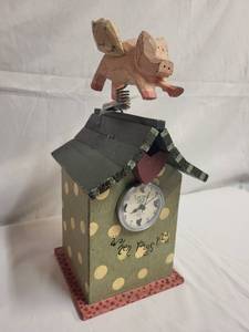 lot 147 image: Whimsical When Pigs Fly Decorative Clock with Carved Pig Figurine