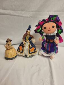 lot 212 image: Set of 3 Handcrafted Dolls Swiss Musical, Russian, and Mexican Designs