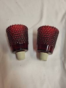 lot 217 image: Set of 2 Vintage Red Glass Candle Holders with Textured Design