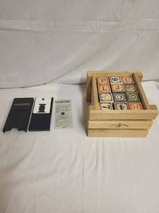 lot 219 image: TANGOES Puzzle Game and Wooden Alphabet Blocks Set