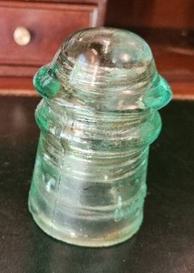 lot 16 image: Antique Glass Insulator with Embossed Markings by O.V.G.Co.