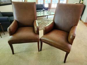 lot 28 image: Pair of Custom Brown Leather Dining Room Chairs with Arms Armchairs