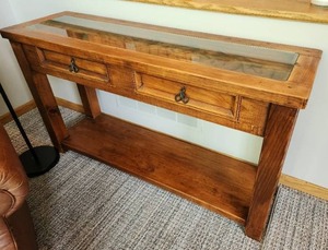 lot 39 image: Vintage Hand Carved Console Table featuring Calla Lily Design and Glass Top