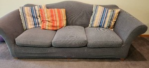 lot 296 image: Used Sofa with Striped Throw Pillows