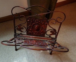 lot 304 image: Ornate Wrought Iron Magazine Rack with Decorative Motif