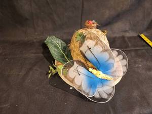 lot 192 image: Decorative Straw Hat with Blue Butterfly and Leaf Accents