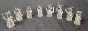 lot 11 image: 8 Handblown Glass Angels created by Edward Carberry.  The figurines are approximately 3 tall.
