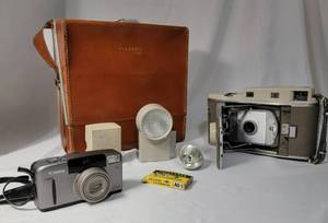 Camera Package.  Vintage 1957 Polaroid 800 camera with leather case and all accessories.  Canon Z115 and Kodak Mini 600 camera