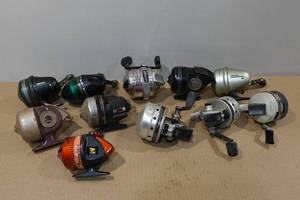 lot 133 image: 11 Fishing Reels -Daiwa, Zebco, Johnson, Southbend