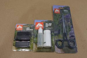 lot 166 image: Ozark Trail Knife Sharpener, OilGrease Kit & Locking Forceps