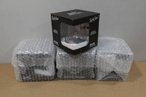 lot 176 image: 4 Lucky Shot Whiskey Glasses with Embedded Bullets