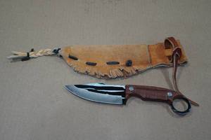 lot 25 image: Finger Hole No Slip Hunting Knife with Leather Sheath