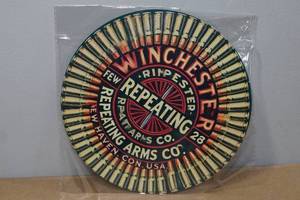 lot 51 image: Novelty Metal Sign - Winchester Repeating Arms Co