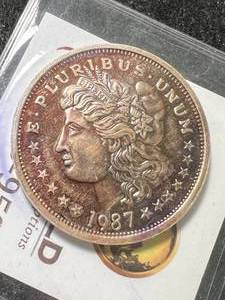 lot 09 image: 1 TROY OZ .999 FINE SILVER MORGAN DOLLAR ROUND