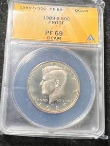 lot 52 image: 1989-S PROOF US KENNEDY HALF DOLLAR ANACS PF69DCAM