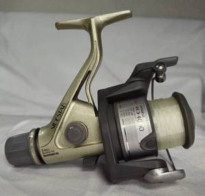 lot 8 image: Shimano Sidestab 4000 RB Spinning Reel shows  some wear works very well
