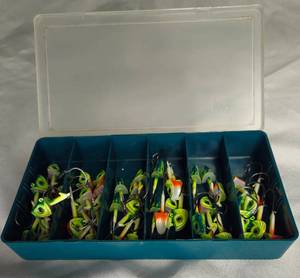 lot 16 image: Tackle box with 46 NEW Northland tackle Mimic Minnow 38oz Jig Heads.