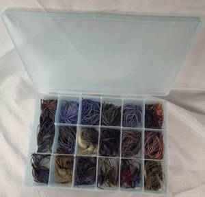 lot 37 image: Box of Skirted Bass Jigs New & Used Mixed
