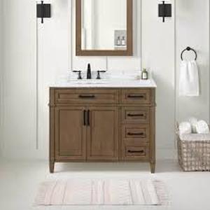 lot 7 image: Home Decorators Collection Caville 30 in. Single Sink Almond Latte Bath Vanity with Carrara Marble Top (Assembled) Customer Returns See Pictures