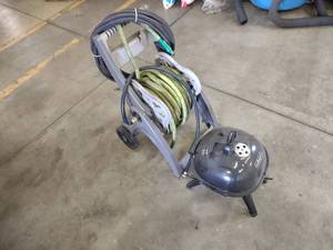 lot 115 image: Grill & Hose Reel...