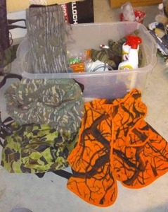 lot 515 image: Misc. Hunting Items In Rubbermaid Covered Tote.