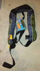 lot 517 image: Cabelas Inflatable Life Jacket With Re-Arming Kit.