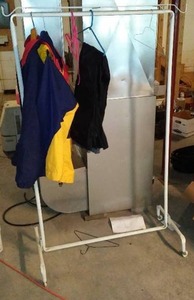 lot 519 image: Clothes Rolling Rack With Columbia Jackets