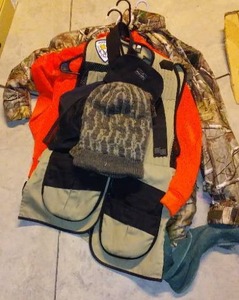 lot 521 image: Camo Jackets, Trap Shooting Vest and More.