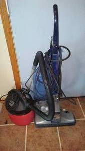 lot 928 image: Kirby Vacuum and 2.5 gal. Shop Vac.