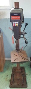 lot 919 image: Craftsman Wood Lathe, Band saw, and Drill Press.