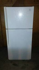 Whirlpool 115V Refrigerator with upper Freezer.