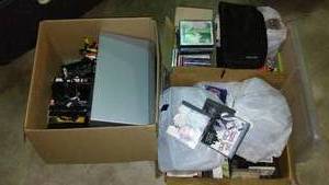 lot 737 image: VHS And DVD Player, VHS And DVDs And More