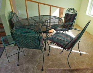 lot 611 image: Wrought Iron Table and Chairs (4).