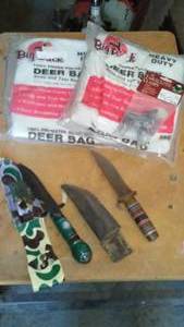 lot 779 image: Knives (2) Deer Bags, Clamps.