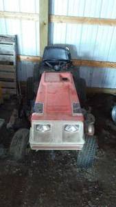 lot 830 image: Dynamark Electric Start 6 Speed Riding Lawn Mower.