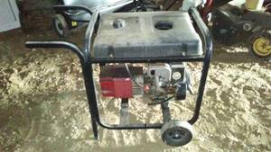 Coleman Powermate 5000 ER Electric Generator.