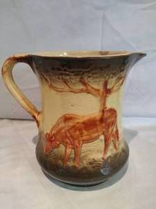 lot 25 image: Very Early ROSEVILLE Pottery Cow Pitcher