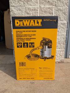 lot 21 image: NEW DEWALT STAINLESS STEEL WETDRY VACUUM