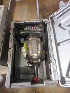 lot 172 image: RYOBI CHAINSAW WITH CASE