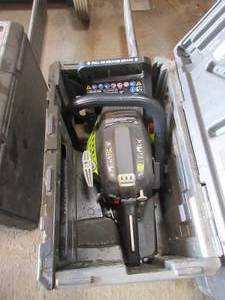 lot 173 image: RYOBI CHAINSAW WITH CASE