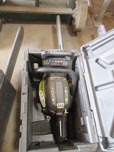 lot 174 image: RYOBI CHAINSAW WITH CASE