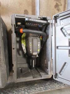 lot 177 image: RYOBI CHAINSAW WITH CASE