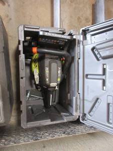 lot 179 image: RYOBI CHAINSAW WITH CASE
