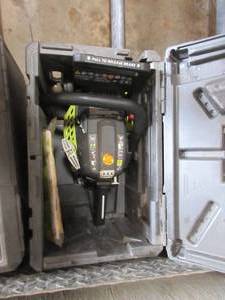 lot 180 image: RYOBI CHAINSAW WITH CASE