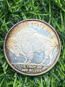 lot 26 image: 12oz .999 Silver Bison  Sioux Round (amazing rainbow toning)