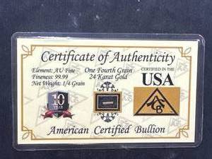 lot 63 image: 14 Grain 24kt Gold Bar