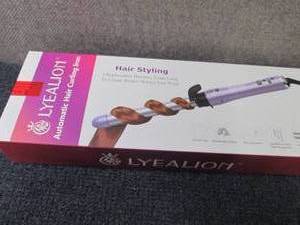 lot 21 image: Lyealion Automatic Hair Curling Lio...