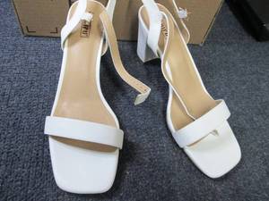 lot 40 image: Ladies Size 11 White Heels...