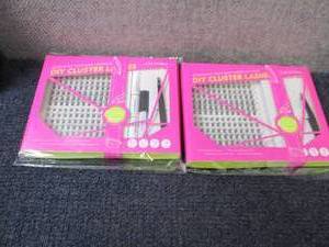 lot 103 image: 2 pks Lash Clusters...